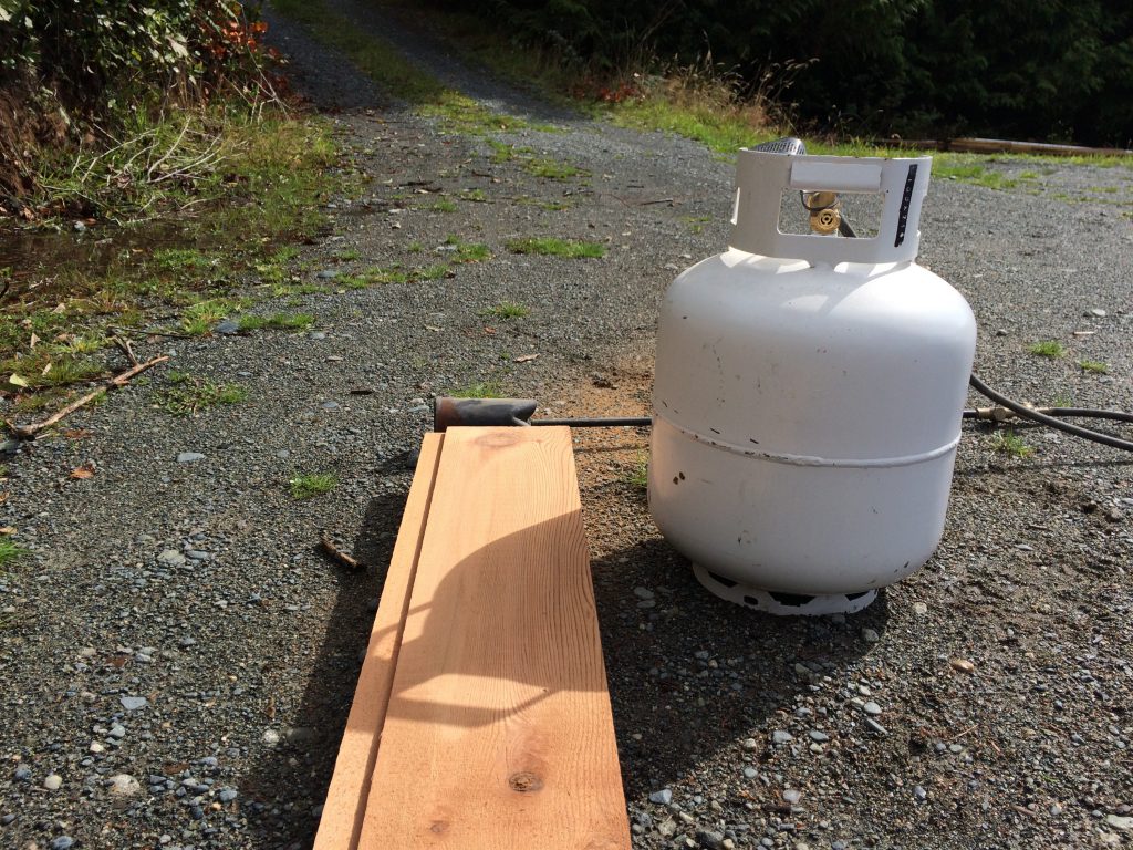 propane torch and cedar